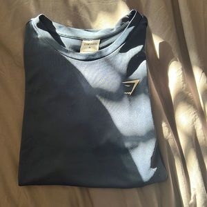 I’m selling a women’s size M navy blue Gymshark t-shirt.